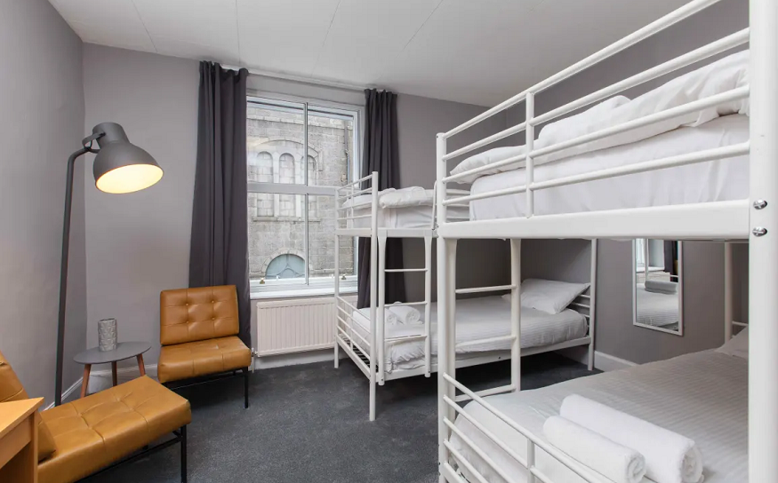 scotland road trip, dorm in citi hostel aberdeen with white metal bunkbeds